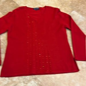 Woman’s red sweater